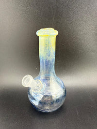 Filla John Mini Rig Wrap And Rake Beaker 10mm 45° showcasing vibrant mixed frit colors and unique design.