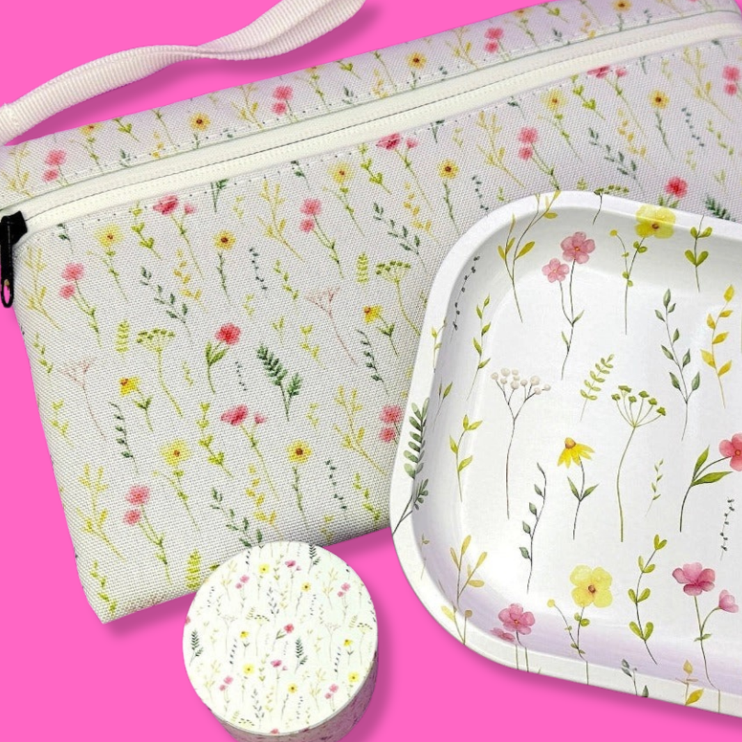 Coming Soon: Floral 3-in-1 Herb Set – Rolling Tray, Grinder & Travel Bag, featuring floral designs on tray and bag.