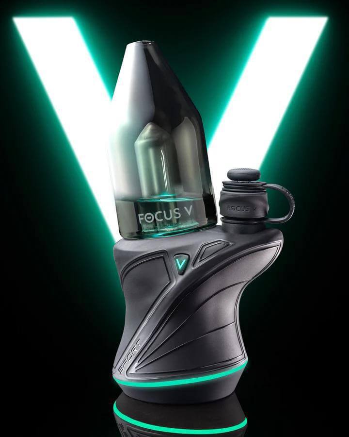 Focus V Carta Sport portable rig with sleek design and intuitive one-button operation, illuminated in neon light.