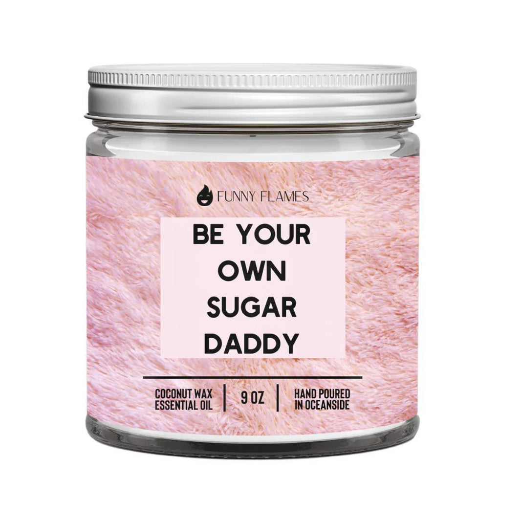 Funny Flames Candle - Be Your Own Sugar Daddy in a glass jar with pink label, 9 oz, coconut wax, hand poured.