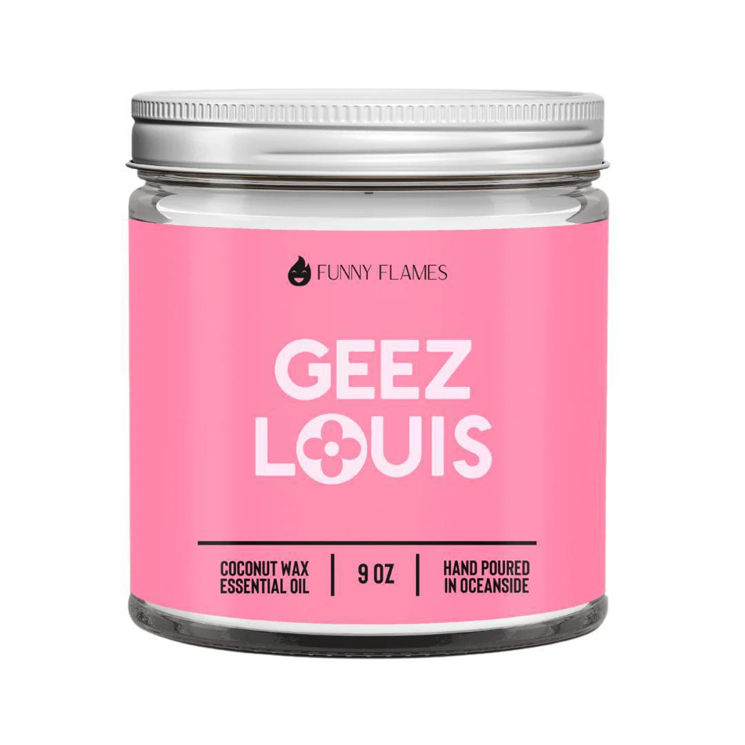 Funny Flames Candle - Geez Louis (Pink) in clear jar with pink label, 9 oz coconut wax candle.