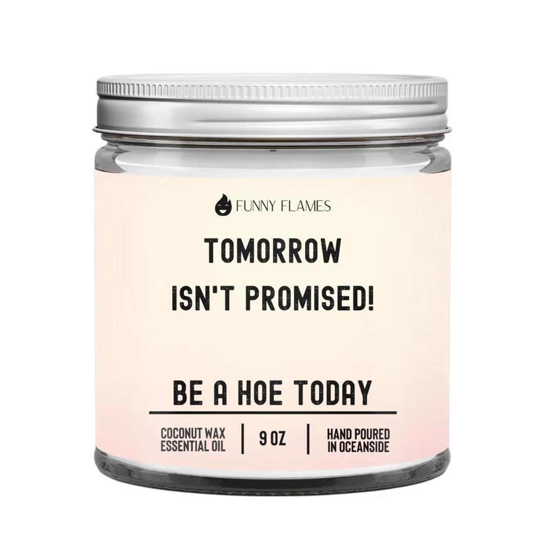 Funny Flames Candle - Tomorrow Isn't Promised in a clear jar with text and a silver lid.
