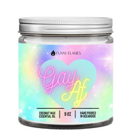 Funny Flames Candle - Gay Af in a vibrant glass jar, showcasing rainbow colors and a heart design.