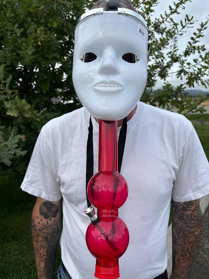 Gas Mask with Bong worn by a person, featuring a white mask and a stylish red bong, perfect for Halloween parties.