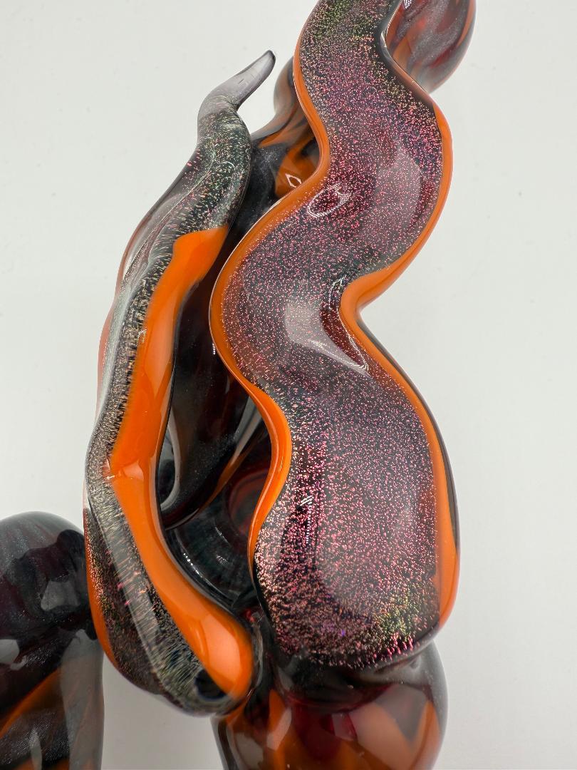 Gemini Glass Dry Pipe in orange and steel wool colors, showcasing unique handcrafted designs and durable borosilicate glass.