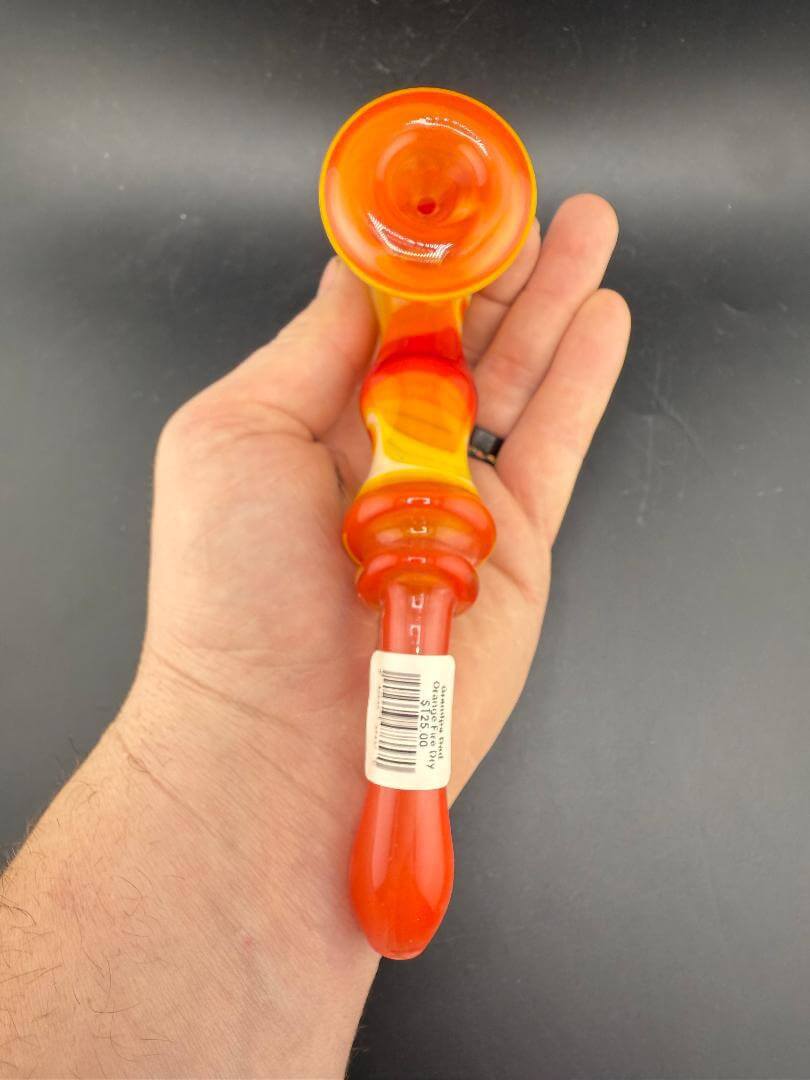 Grandpa Dad Glass Sherlock Pipe - Orange w/ Fire Line Work held in hand, showcasing vibrant orange color and design.