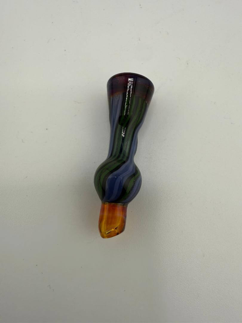 Colorful glass smoking accessory with a unique shape, handcrafted for optimal functionality.