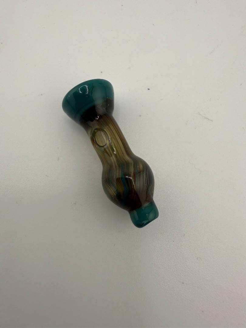 Handcrafted glass ball cap for Puffco Peak Pro, featuring unique amber and teal design, optimizing airflow.