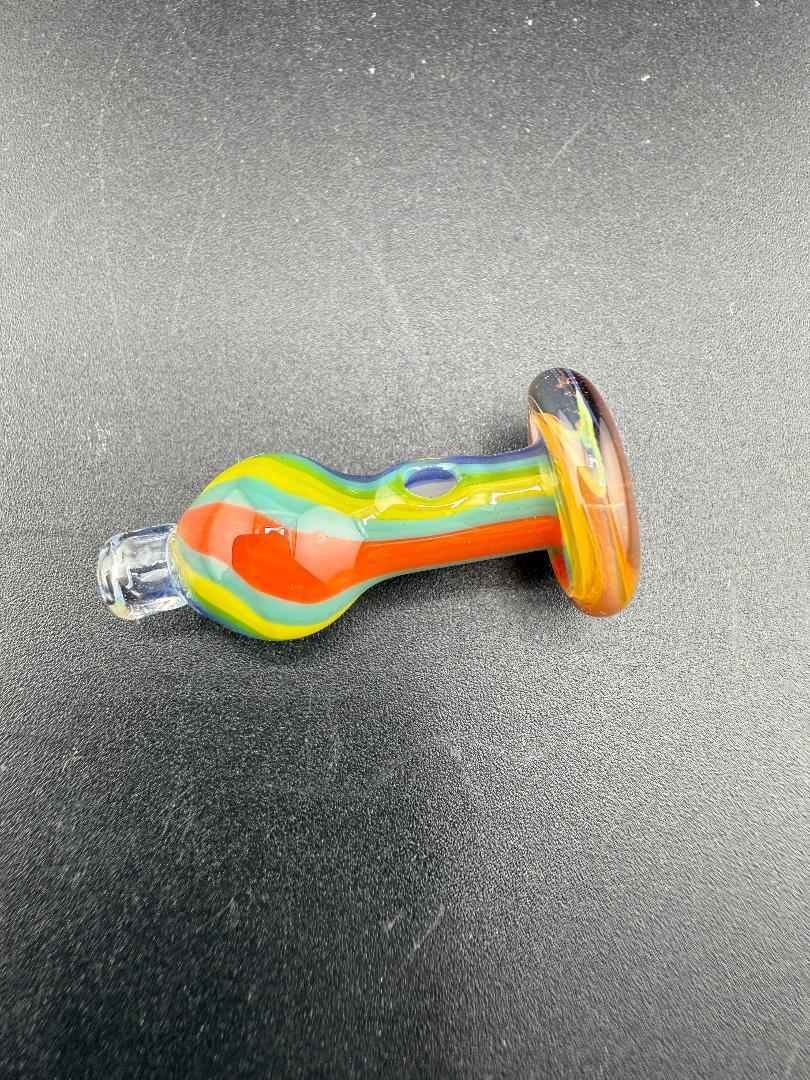 Colorful handcrafted glass pipe featuring vibrant stripes and a round bowl