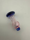 Handcrafted pink and blue glass ball cap designed for Puffco Peak Pro, optimizing airflow for flavorful dabs.