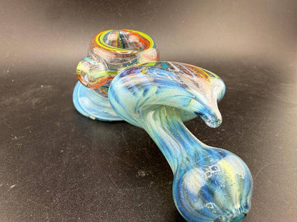 High Grade Glass Hammer Pipe - Light Blue w/ Rainbow  Line Worked Sections on a dark surface.