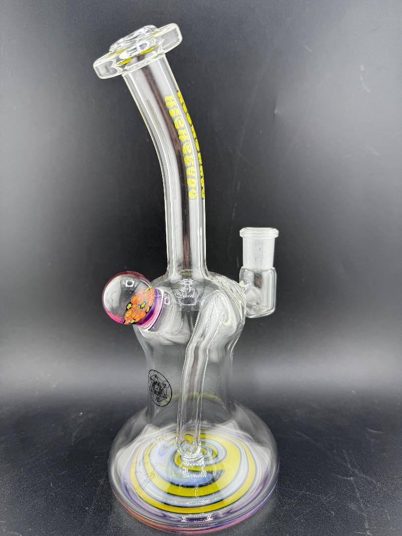 Highgrade Glass Banger Hanger w/ Reversal Bottom 14mm 90° showcasing vibrant colors and unique design.
