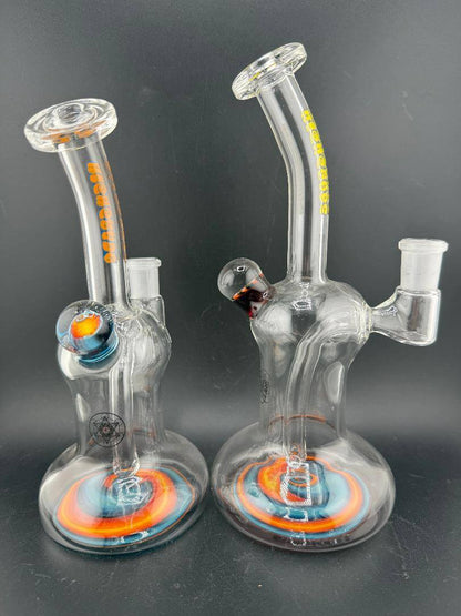 Highgrade Glass Banger Hanger w/ Reversal Bottom 14mm 90° showcasing colorful designs and unique styles.