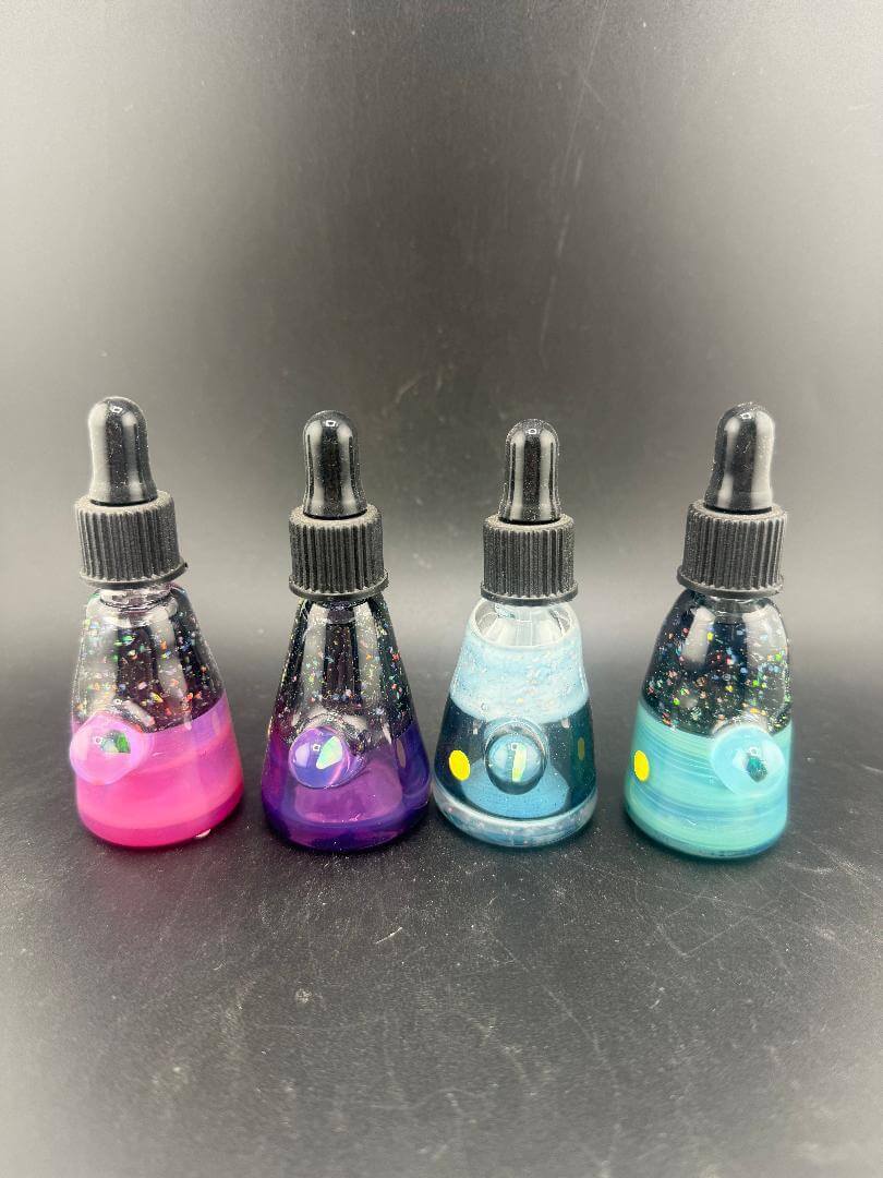 Highgrade Glass Dropper Bottle / Vial - Crushed Opal in four stunning colors: pink, purple, blue, and green.
