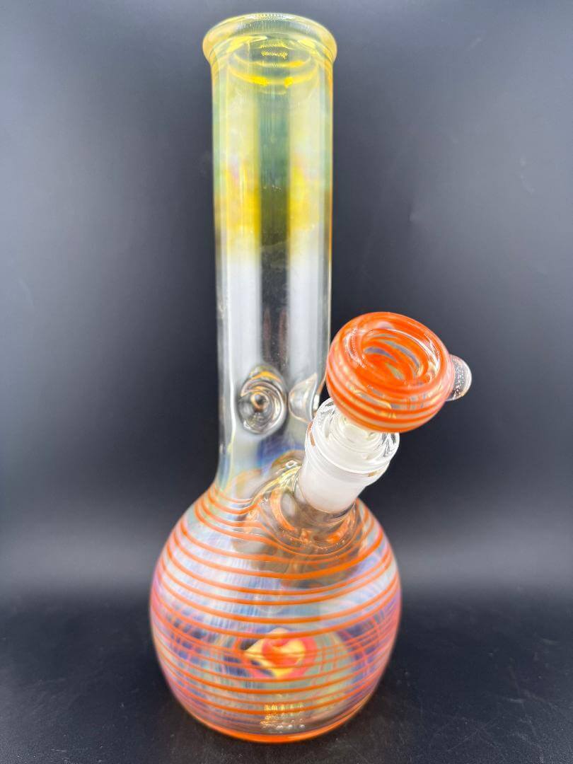 Highgrade Glass Flower Beaker - OG Style Fumed 14mm 45° featuring colorful fuming and unique design.