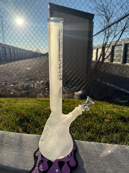 Highgrade Glass Flower Beaker - Sandblasted Sacred Geometry 14mm 45° displayed outdoors with detailed design.