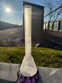Highgrade Glass Flower Beaker - Sandblasted Sacred Geometry 14mm 45° displayed outdoors with sunlight.