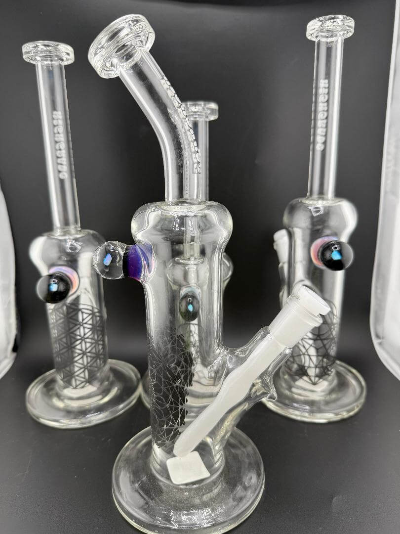 Highgrade Glass Flower Straight Tube - 10" Mini Opal Marble & Bake On Sacred Geometry 10mm 45° glass tubes displayed.