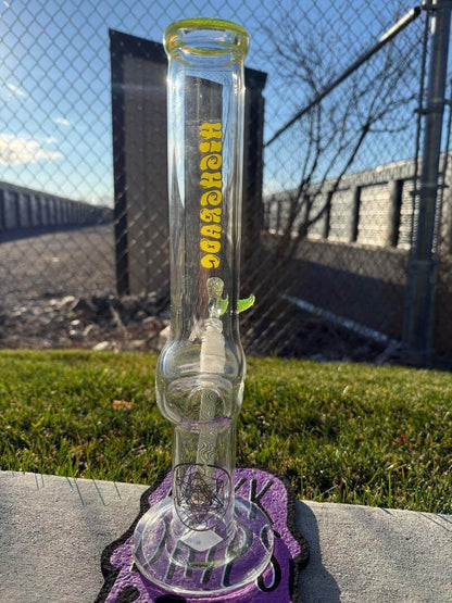 Highgrade Glass Flower Straight Tube – Green & White Wig Wag Color Accent Pistol Loop 14mm 45° in a sunny outdoor setting.