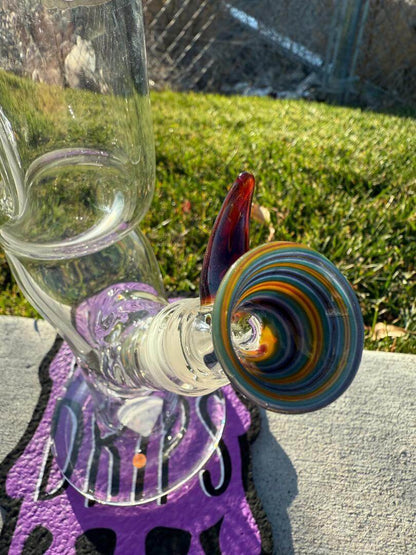 Highgrade Glass Flower Straight Tube - Rainbow & Amber Wig Wag Color Color Accent Pistol Loop 14mm 45° featuring vibrant color accents.