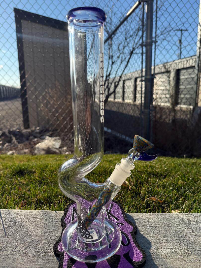 Highgrade Glass Flower Straight Tube - Rainbow & Blue Wig Wag Color Color Accent Pistol Loop 14mm 45° on display.