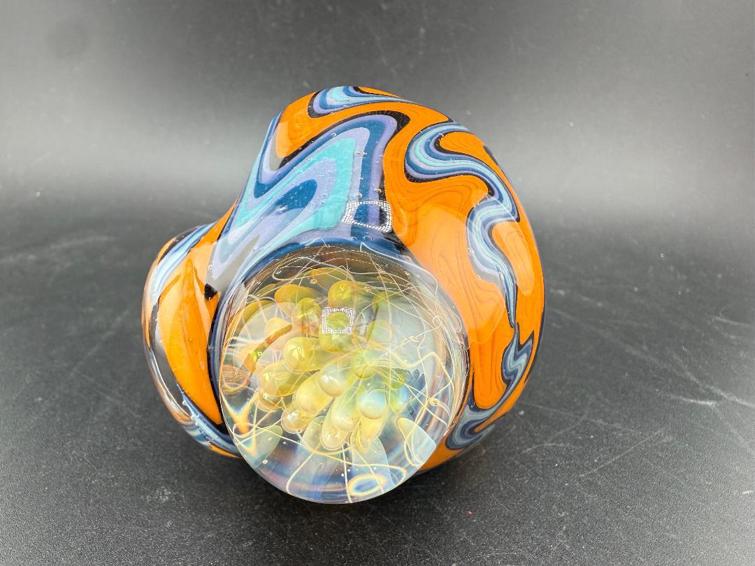 Highgrade Glass Hand Pipe - Blue & Orange Wig Wag w/ Fumed Implosion Marble with intricate patterns and stunning details.
