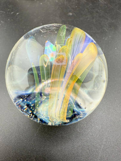 Highgrade Glass Marble - 38mm Skull Millie Implosion featuring vibrant colors and intricate design.