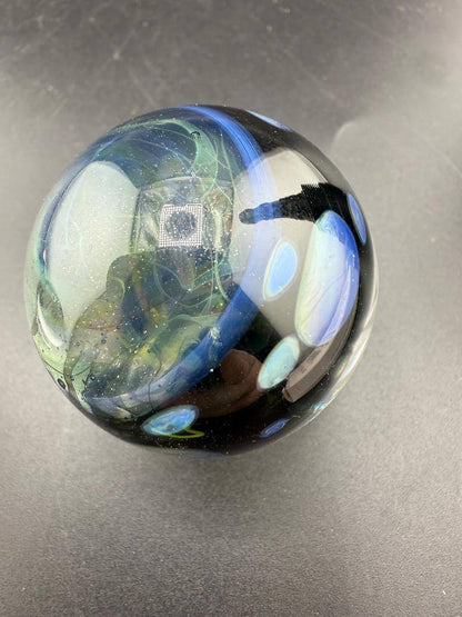 Highgrade Glass Marble - Fumed Implosion Apporx. 1.4" with layered fumed design and mesmerizing colors.