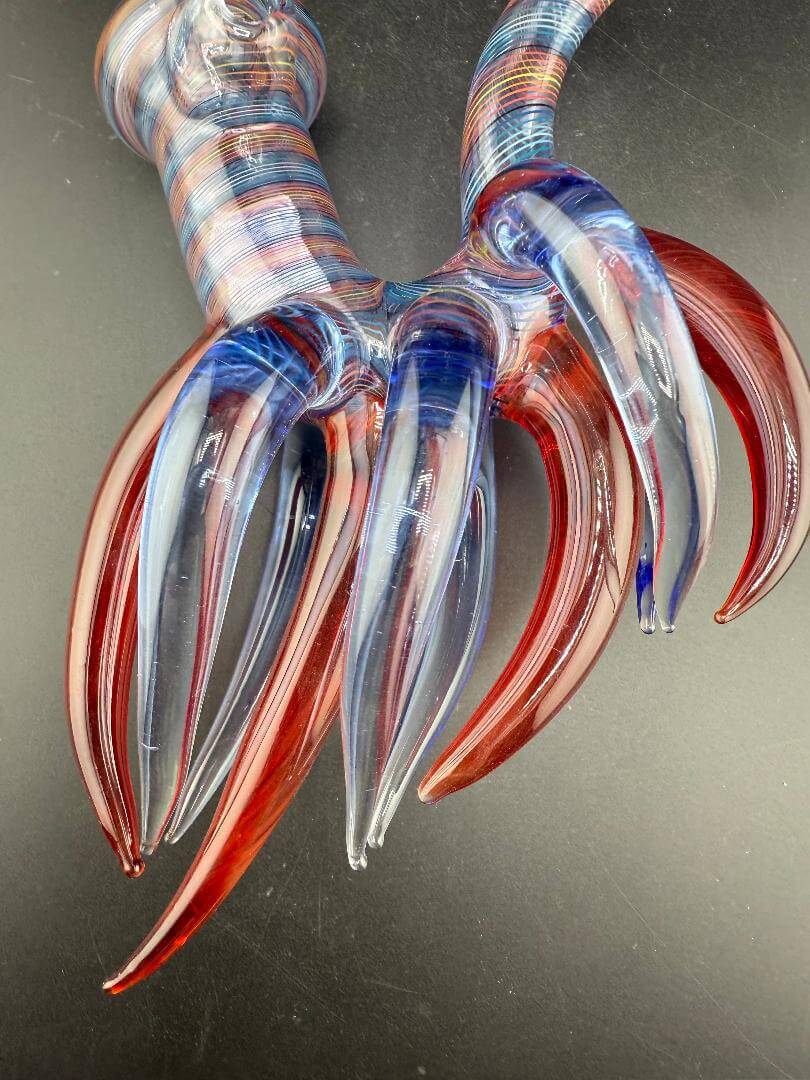 Highgrade Glass Sherlock Pipe- Red & Blue Line Work w/ Many Red & Blue Large Horns close-up view of the horns.