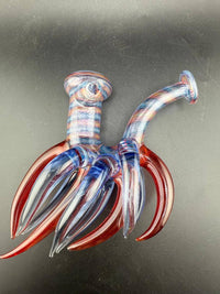 Highgrade Glass Sherlock Pipe- Red & Blue Line Work w/ Many Red & Blue Large Horns on a black background.
