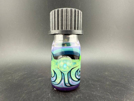 Highgrade Glass Small Nug Jar - Green Purple & Blue Wig Wag w/ Opal showcasing vibrant colors and unique design.