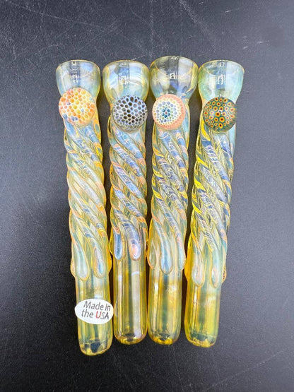 Home Blown Glass Chillum Pipe - Fumed & Twisted w/ Millie Accent in various designs on a black surface.