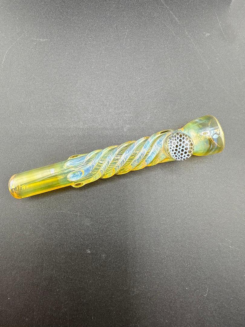 Home Blown Glass Chillum Pipe - Fumed & Twisted w/ Millie Accent on black background