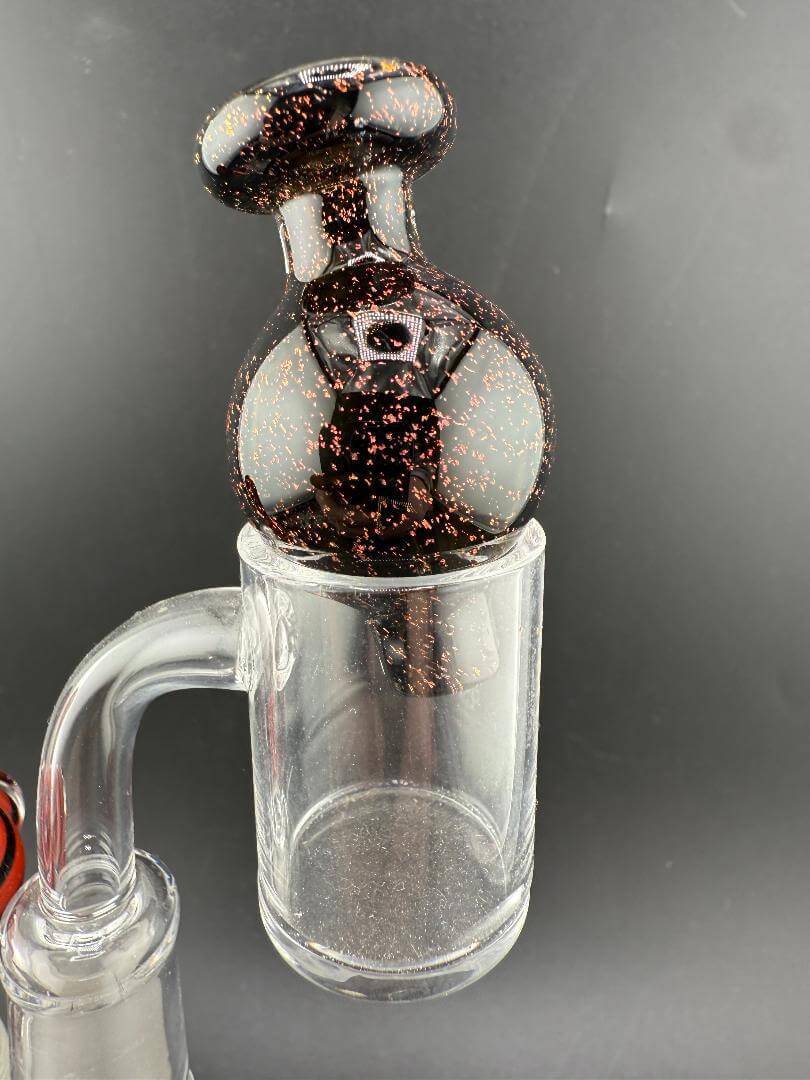 Import Bubble Cap 25mm - Dichro in sparkling red, blue, and gold accents for enhanced vaporization quality.