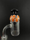 Import Bubble Cap 25mm - Dot Stack for enhanced dabbing, featuring a vibrant orange and black design.