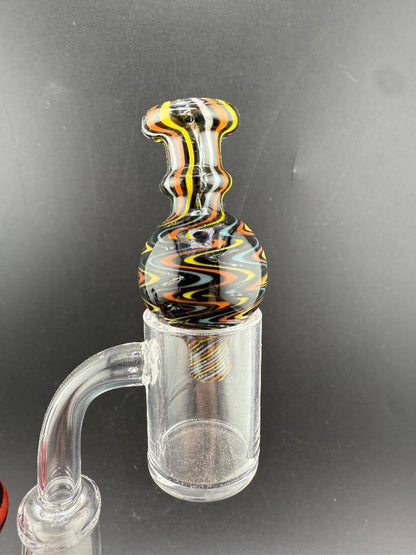 Import Bubble Cap 25mm - Wig Wag with vibrant linework for efficient vaporization on quartz bangers.