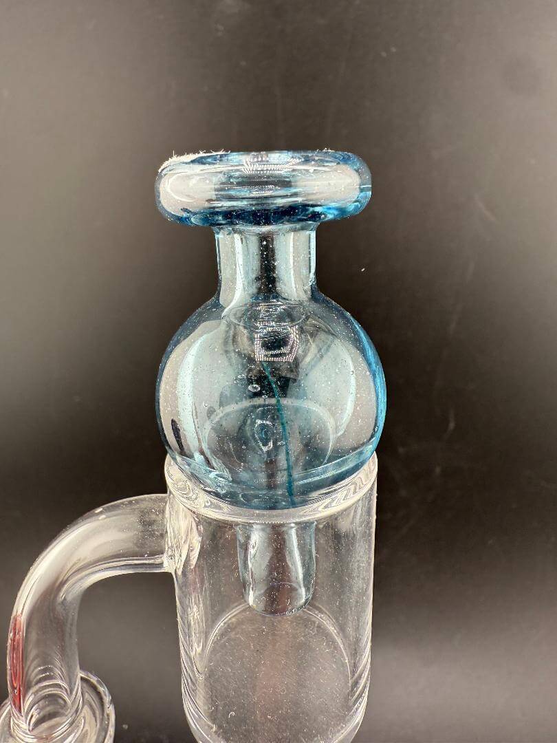 Import Bubble Cap - Translucent w/ Maria Handle in blue color, showcasing smooth airflow and comfortable grip.