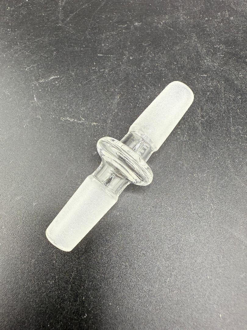 Import Glass Adapter -10mm Male To 10mm Male connecting two 10mm female joints made of durable borosilicate glass.