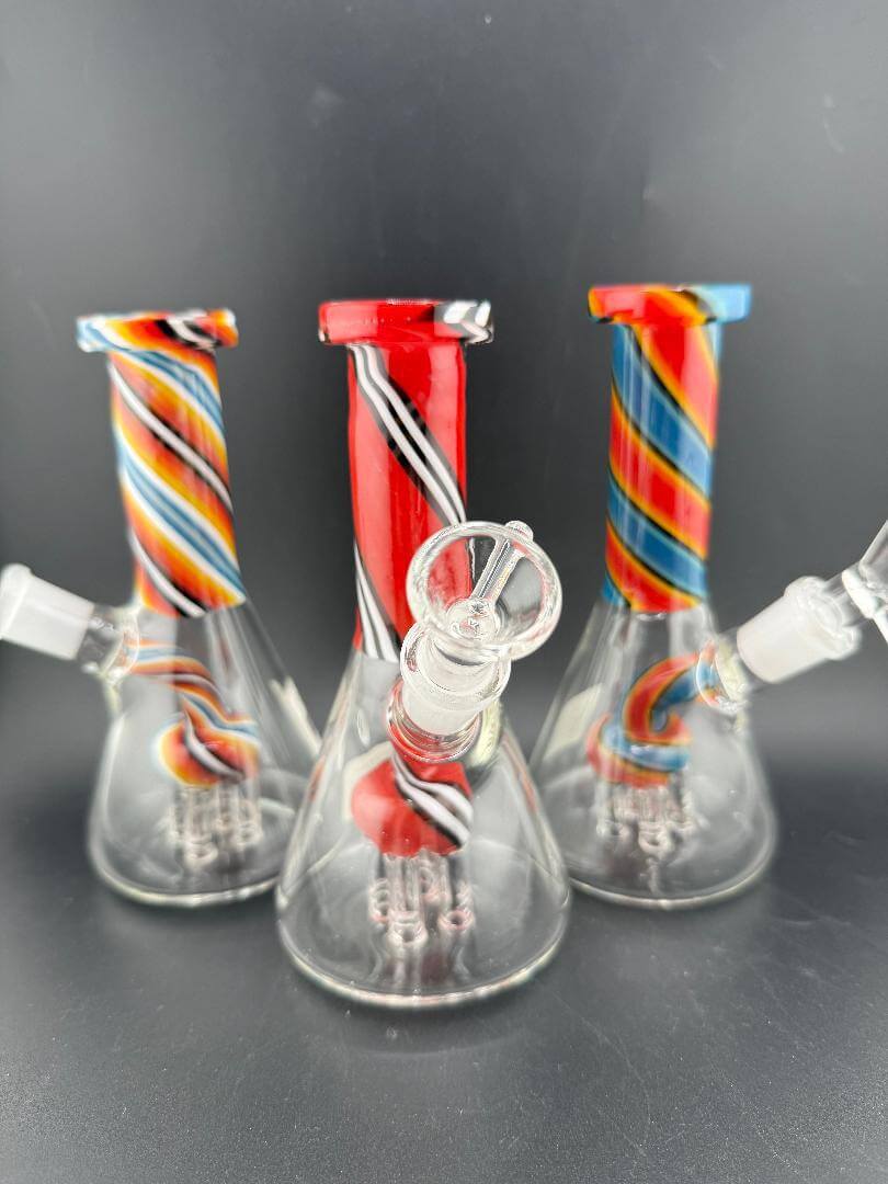 Import Glass 6" Swirl Neck Tree Perk Rig 14mm 45° displayed with colorful striped designs.
