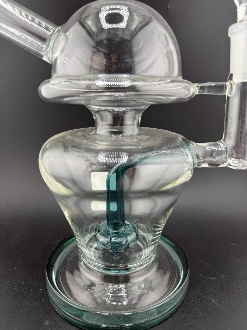 Import Glass Disk Perk Globe Rig 14mm 90° showcasing its unique globe design and disk percolator for smooth hits.