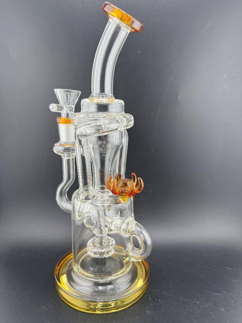 Import Glass Disk Perk Recycler 14mm 90° in clear and amber colors, showcasing stylish design and efficient filtration.