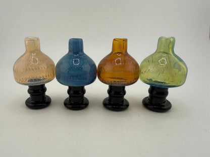 Import Glass Fumed Bubble Cap in Fumed, Blue, Amber, and Green colors, showcasing stylish design and durable borosilicate glass.