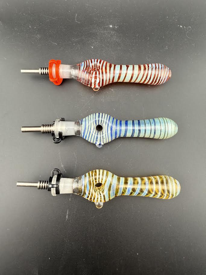 Import Glass Nector Collector w/ Titanium Tip in red, blue, and yellow strip designs on a black background.