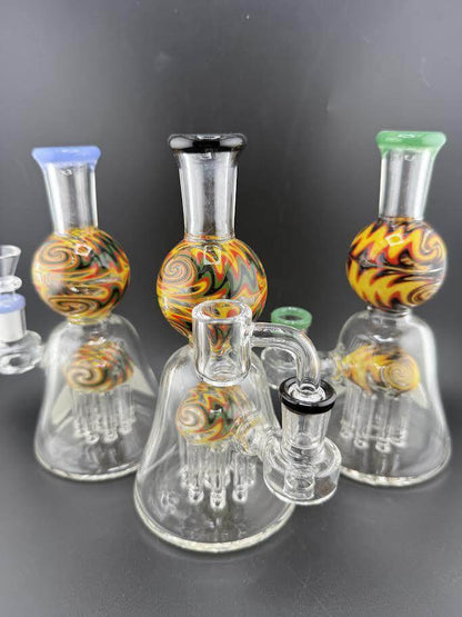 Import Glass Wig Wag Tree Perk 7" 14mm 90° with vibrant designs and tree percolators for smooth hits.