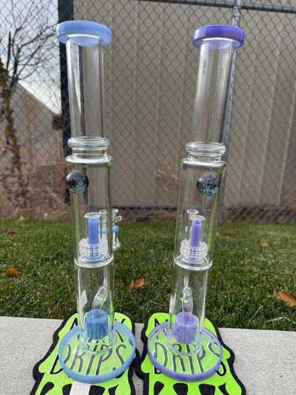 Import Swiss Perk To Matrix Rig 14mm 90° in purple and blue with Swiss-style percolator for smooth hits.