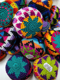 Import Woven Kick Balls / Hacky Sack – Colorful handwoven kick balls in various designs, perfect for juggling and footbag tricks.