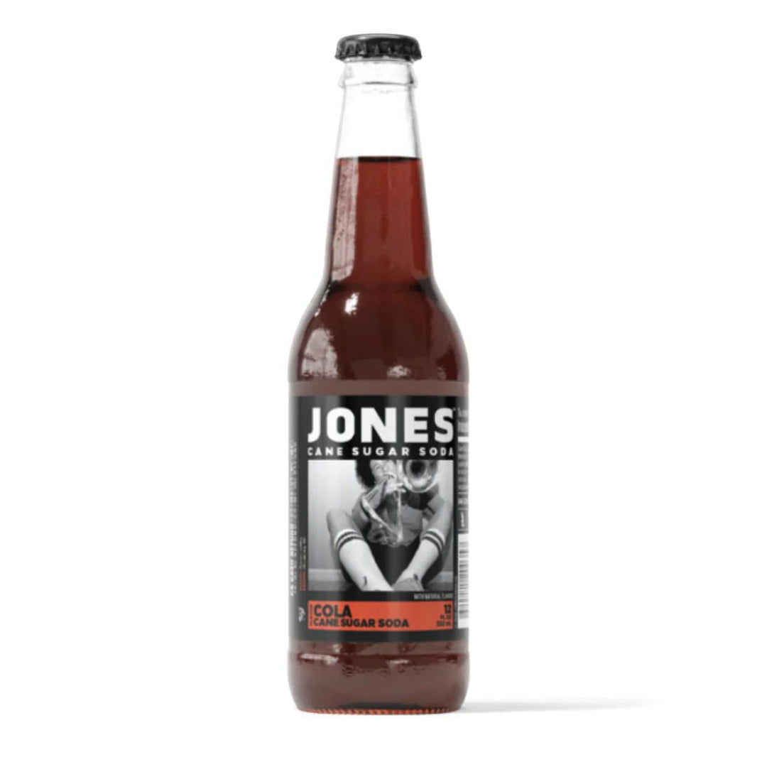 Jones Soda 12oz Bottle featuring bold cola flavor and real cane sugar in a classic glass bottle design.