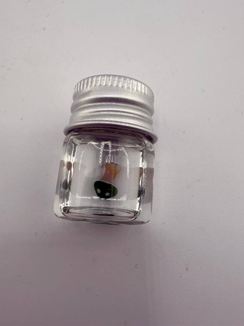 Lucky Gnome Glass Terp Pearl in jar, mushroom design, ideal for enhancing dab setups.