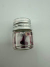 Lucky Gnome Glass Terp Pearl in a glass jar with silver lid, showcasing a playful novelty design for dab rigs.