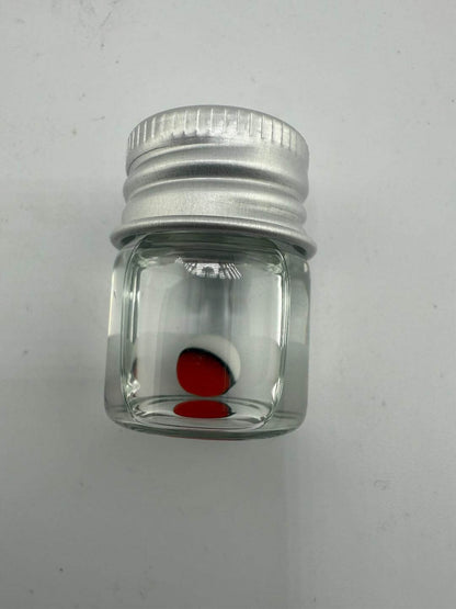 Lucky Gnome Glass Terp Pearl in a jar, designed like a Pokeball for enhanced dabbing experience.